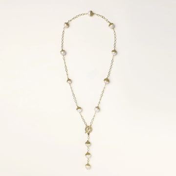 Long gold-plated lariat necklace featuring baroque pearls with metal caps arranged in elegant Y-shape design