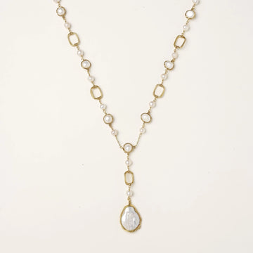 Y-shaped gold-plated necklace with freshwater pearls and geometric elements, featuring a baroque pearl pendant drop