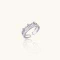 Adjustable gold-plated crown ring with zirconia crystals in ornate tiara design on white background.